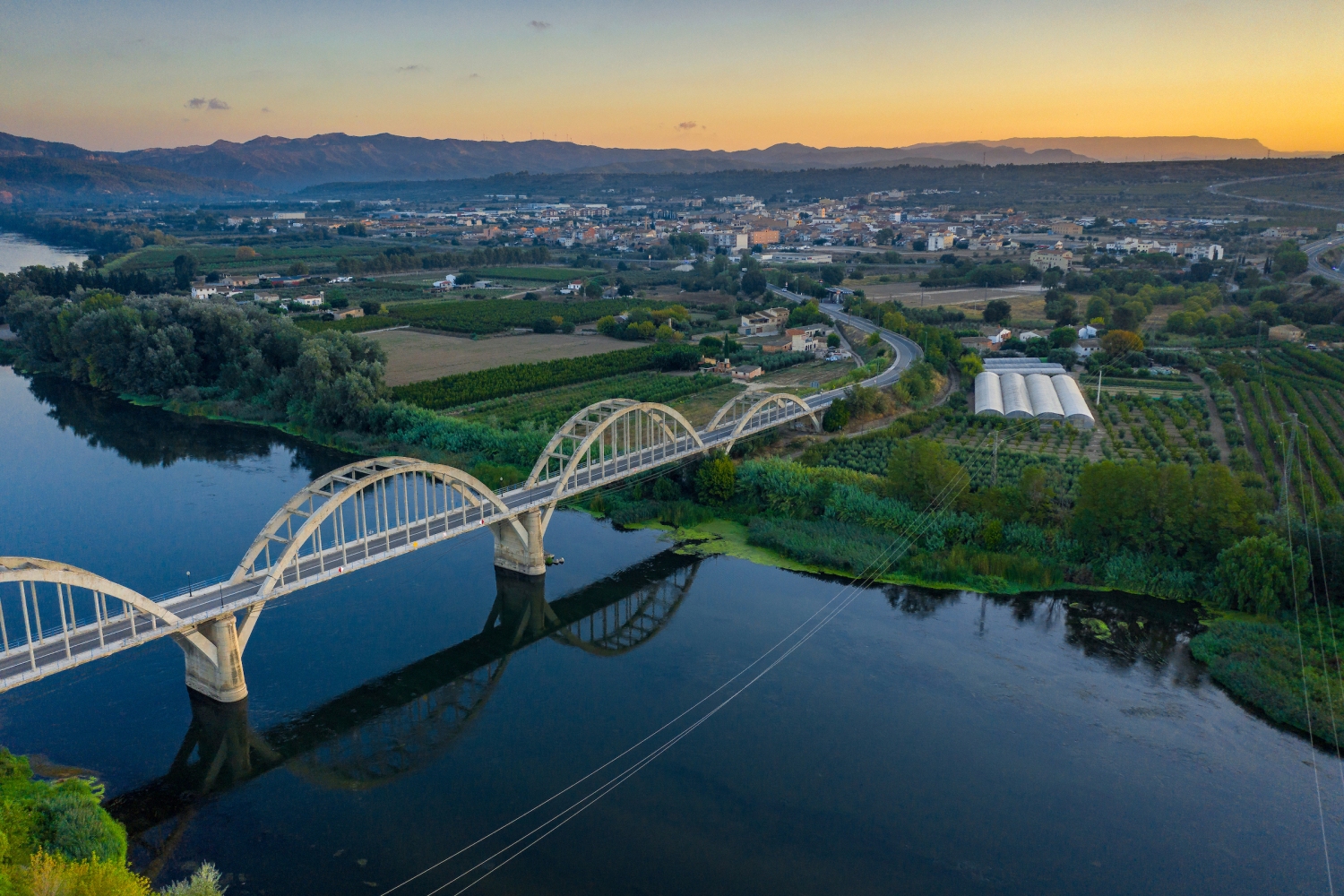 Turisme Ribera dEbre (Aerial View Of The City Of Mora La Nova In A Summer Sunrise Ribera D Ebre Tarragona Catalonia Spain_009)